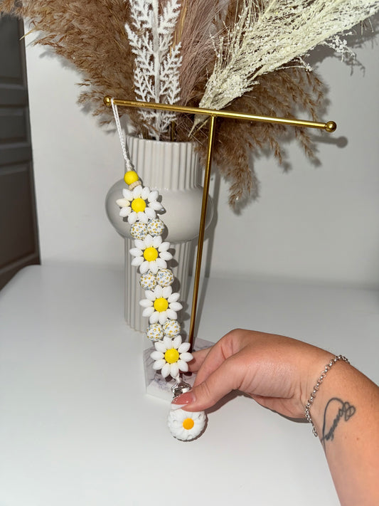 Attache tétine florale