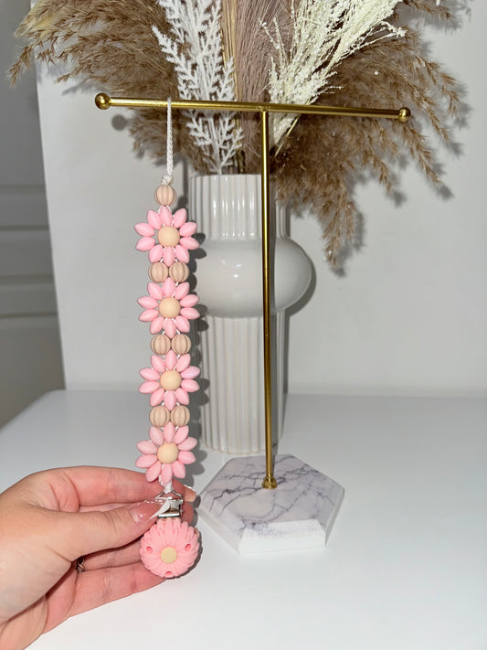 Attache tétine florale